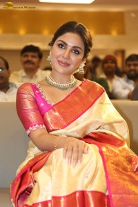 actress samyuktha menon in a saree attending a movie function