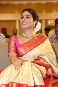 actress samyuktha menon in a saree attending a movie function