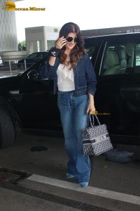 actress sangeeta bijlani stylish look in jeans at mumbai airport