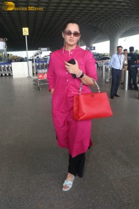 Indian tennis player Sania Mirza in a pink salwar dress at mumbai airport