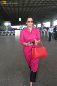 Indian tennis player Sania Mirza in a pink salwar dress at mumbai airport