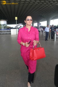 Indian tennis player Sania Mirza in a pink salwar dress at mumbai airport