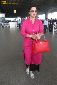 Indian tennis player Sania Mirza in a pink salwar dress at mumbai airport