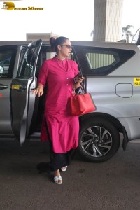 Indian tennis player Sania Mirza in a pink salwar dress at mumbai airport