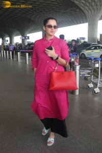 Indian tennis player Sania Mirza in a pink salwar dress at mumbai airport