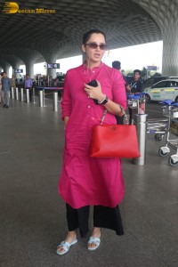 Indian tennis player Sania Mirza in a pink salwar dress at mumbai airport
