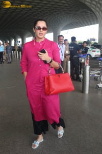 Indian tennis player Sania Mirza in a pink salwar dress at mumbai airport