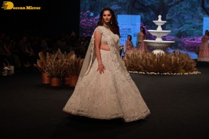 Tennis player Sania Mirza walks the ramp at Lakme Fashion Week 2022 in white lehenga choli