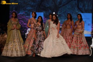 Tennis player Sania Mirza walks the ramp at Lakme Fashion Week 2022 in white lehenga choli