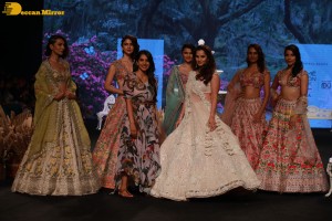 Tennis player Sania Mirza walks the ramp at Lakme Fashion Week 2022 in white lehenga choli