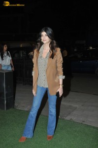 actress Sanjana Sanghi poses in a jacket and denim jeans