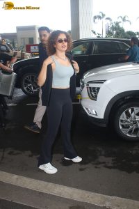 actress Sanya Malhotra in a blue tank top at mumbai airport