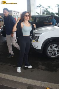 actress Sanya Malhotra in a blue tank top at mumbai airport