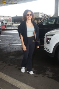 actress Sanya Malhotra in a blue tank top at mumbai airport