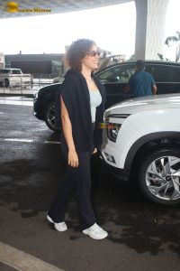 actress Sanya Malhotra in a blue tank top at mumbai airport