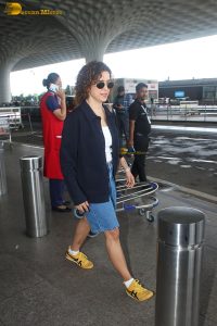 actress Sanya Malhotra cute in white top and denim shorts