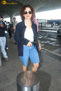 actress Sanya Malhotra cute in white top and denim shorts