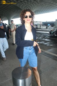 actress Sanya Malhotra cute in white top and denim shorts