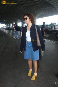 actress Sanya Malhotra cute in white top and denim shorts