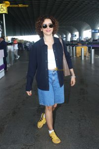 actress Sanya Malhotra cute in white top and denim shorts