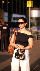 actress sanya malhotra gorgeous in a black top and sunglasses