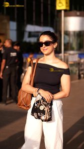 actress sanya malhotra gorgeous in a black top and sunglasses