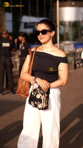 actress sanya malhotra gorgeous in a black top and sunglasses