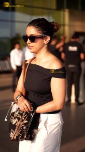 actress sanya malhotra gorgeous in a black top and sunglasses