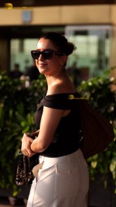 actress sanya malhotra gorgeous in a black top and sunglasses
