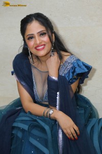 Indian actress sanya thakur sexy photoshoot in a cleavage revealing blue dress