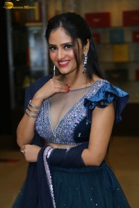 Indian actress sanya thakur sexy photoshoot in a cleavage revealing blue dress