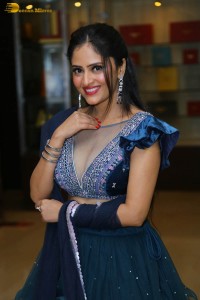 Indian actress sanya thakur sexy photoshoot in a cleavage revealing blue dress