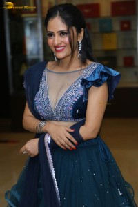 Indian actress sanya thakur sexy photoshoot in a cleavage revealing blue dress