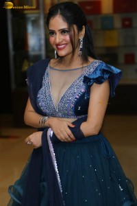 Indian actress sanya thakur sexy photoshoot in a cleavage revealing blue dress