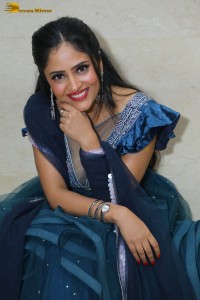 Indian actress sanya thakur sexy photoshoot in a cleavage revealing blue dress