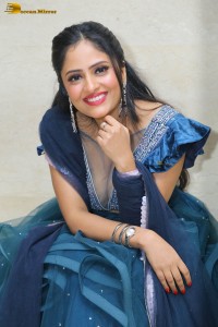 Indian actress sanya thakur sexy photoshoot in a cleavage revealing blue dress