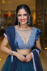 Indian actress sanya thakur sexy photoshoot in a cleavage revealing blue dress