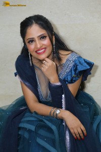 Indian actress sanya thakur sexy photoshoot in a cleavage revealing blue dress