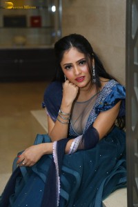 Indian actress sanya thakur sexy photoshoot in a cleavage revealing blue dress