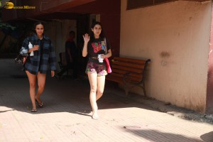 bollywood actress Sara Ali Khan leaving gym in shorts