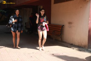 bollywood actress Sara Ali Khan leaving gym in shorts