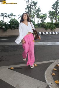 bollywood actress Sara Ali Khan cute in a white top and pink pants