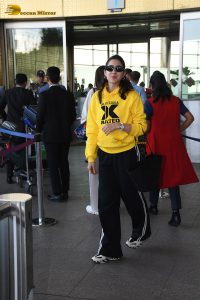 bollywood actress Sara Ali Khan gorgeous in a yellow top and black pants