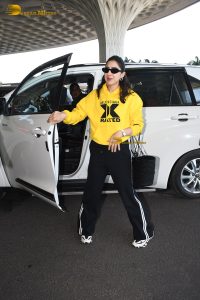 bollywood actress Sara Ali Khan gorgeous in a yellow top and black pants