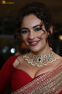 actress Seerat Kapoor dazzling in a red saree