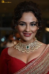 actress Seerat Kapoor dazzling in a red saree