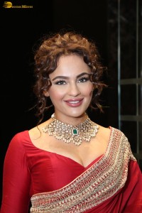 actress Seerat Kapoor dazzling in a red saree