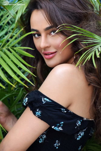 Model and Telugu Actress Seerat Kapoor Photoshoot in a black dress