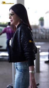 actress Sherlyn Chopra sexy and stylish in a jacket at airport