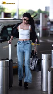 actress Sherlyn Chopra sexy and stylish in a jacket at airport